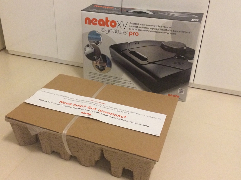 neato-xv-signature-pro-box-unpacked-inside-covered