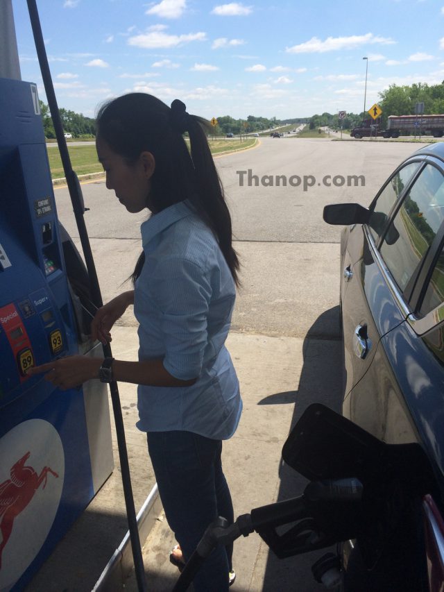 Driving in USA Refueling at Gas Station